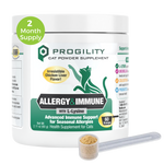 A white tub of ProGility Allergy & Immune cat powder supplement with a green and black label, shown on a white background with a small clear scoop containing beige powder in front and a green '2 Month Supply' badge on the upper left.