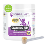 A white plastic tub of ProGility Calming Aid cat powder supplement with a purple cat silhouette logo, shown on a white background with a small clear scoop containing beige powder in front and a green circular '2 Month Supply' badge at the top left.